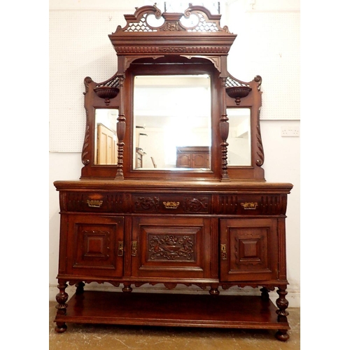 1076 - A Victorian mahogany mirror back sideboard with swan neck scroll pediment and carved decoration, 153... 