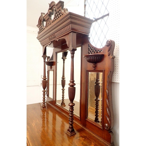 1076 - A Victorian mahogany mirror back sideboard with swan neck scroll pediment and carved decoration, 153... 