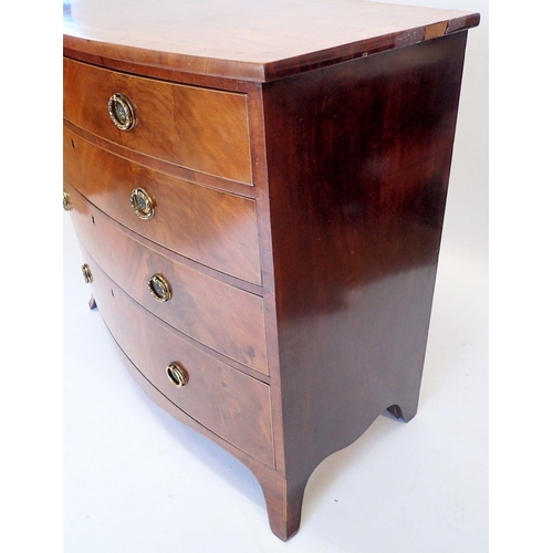 1077 - A large George III inlaid mahogany bow front chest of four long drawers with brass ring handles on s... 