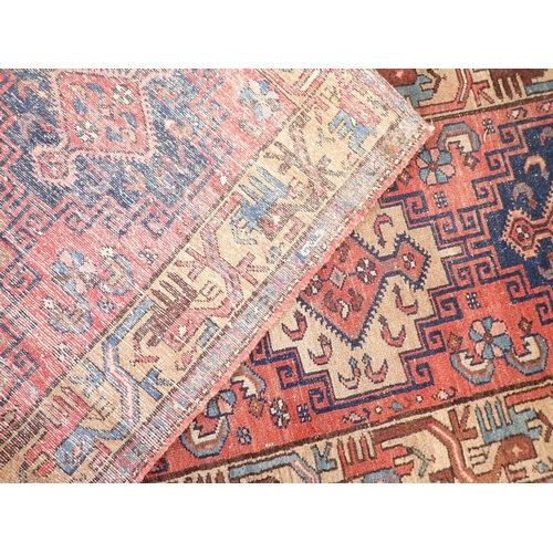 1087 - A Turkoman style runner with hooked  medallion design 293 x 76cm