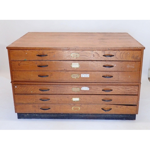 1088 - A large oak finish vintage plan chest with six drawers, 147cm wide