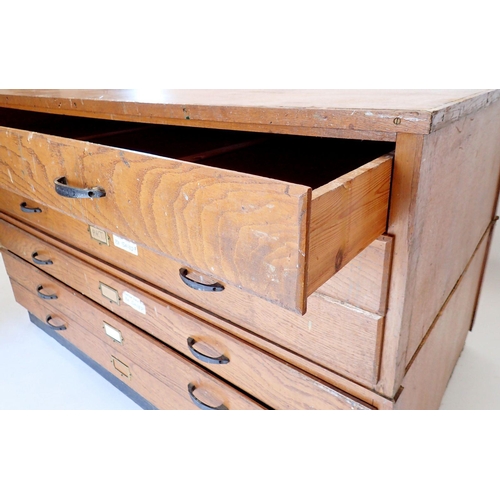 1088 - A large oak finish vintage plan chest with six drawers, 147cm wide