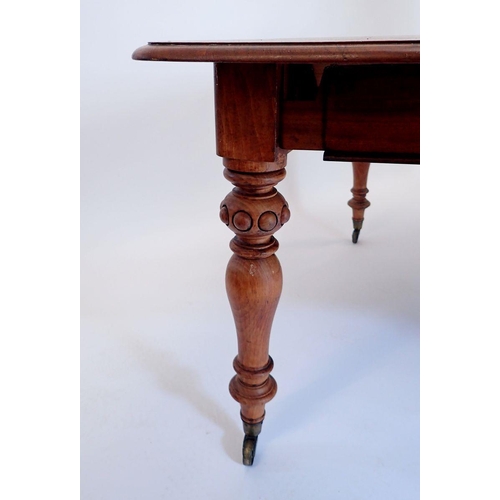 1092 - A Victorian mahogany wind-out dining table with two interleaves, all raised on baluster supports and... 