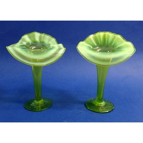 115 - Two Edwardian Vaseline glass pulpit vases, 29cm tall