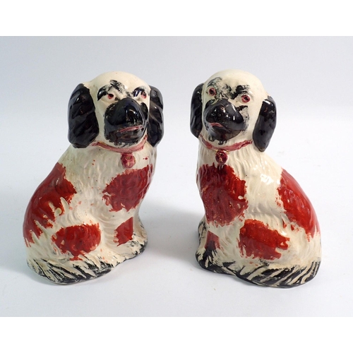 16 - A pair of small Staffordshire dogs, 17cm high