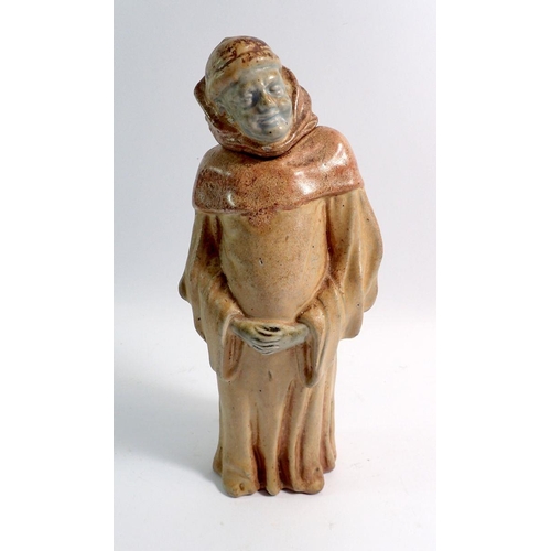 19 - A French pottery monk decanter, the lid formed as the head, 33cm high