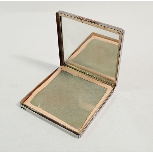 266 - A silver engine turned compact with 9 carat rose gold detailing, Birmingham 1933 by M & Co. 7.7cm sq... 