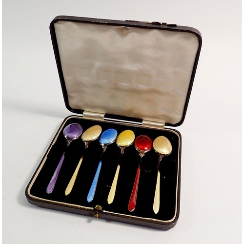 267 - A matched set of six harlequin enamel teaspoons, boxed, circa 1920's