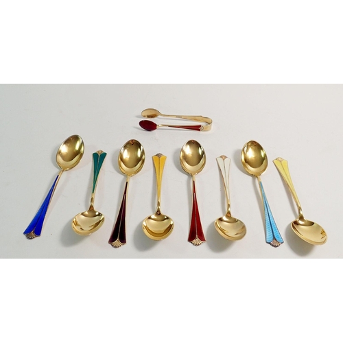 268 - A collection of eight Norwegian David Andersen harlequin silver gilt and enamel teaspoons and a pair... 