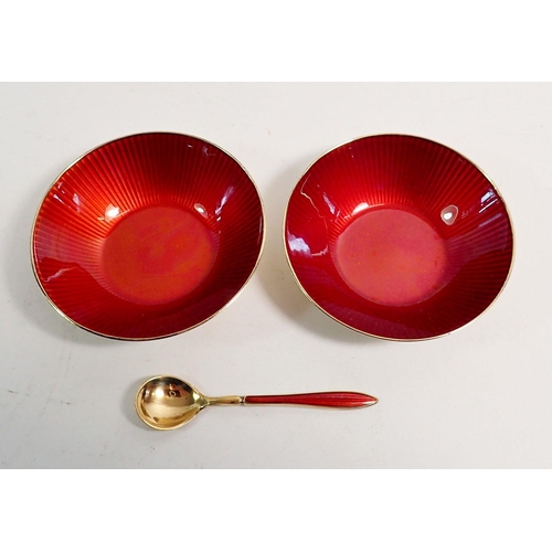 276 - A pair of Norwegian David Andersen silver gilt and red enamel circular salts and one spoon