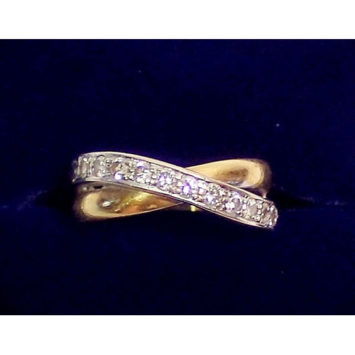 291 - An 18 carat gold diamond set twin crossover ring, size K-l, 5g