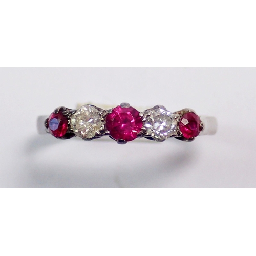 292 - An 18 carat white gold ring set three rubies and two diamonds, size O, 2.8g