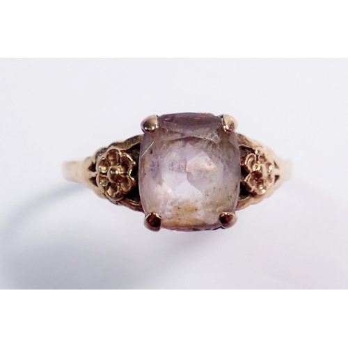 296 - A 9 carat gold amethyst ring with floral shoulders, size P, 2.2g