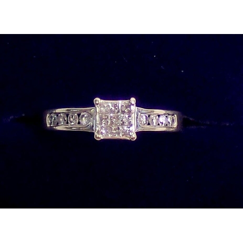 297 - An 18 carat white gold ring set square panel of nine chip diamonds on diamond set shoulders, size L,... 