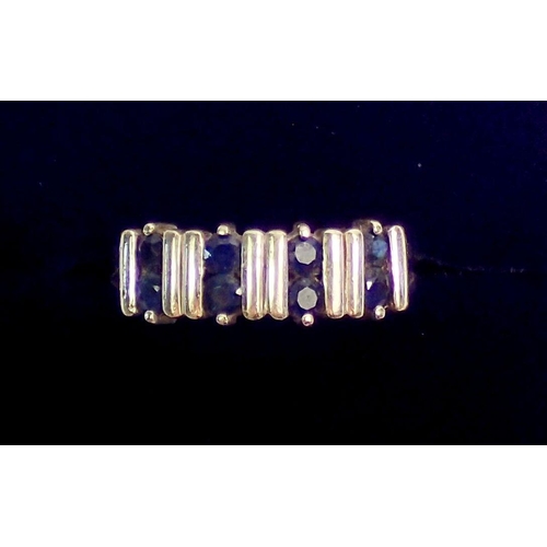 305 - A 9 carat gold ring set five pairs of sapphires, size N, 2.8g