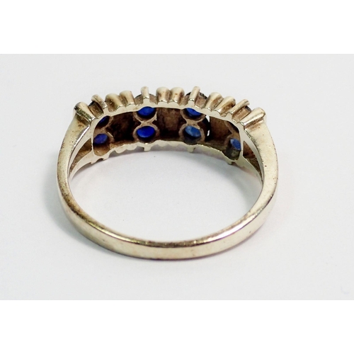 305 - A 9 carat gold ring set five pairs of sapphires, size N, 2.8g