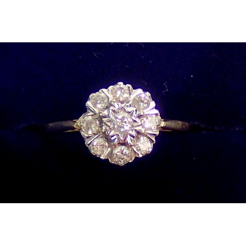 311 - An 18 carat white gold diamond cluster ring, size P to Q, 2.9g