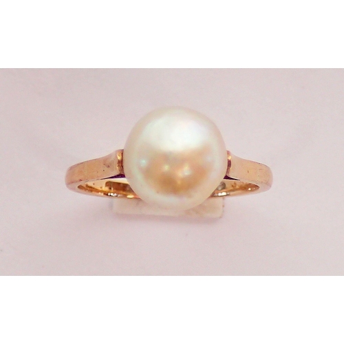 312 - A French 18 carat gold ring set pearl, size K, 3g, with eagle head mark