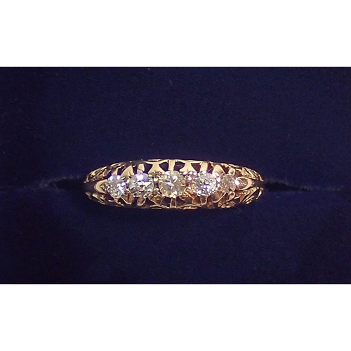 316 - An 18 carat gold ring set five graduated diamonds, size J to K, 3.7g