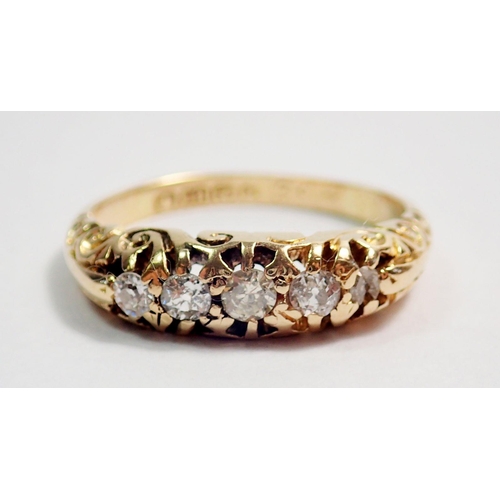 316 - An 18 carat gold ring set five graduated diamonds, size J to K, 3.7g