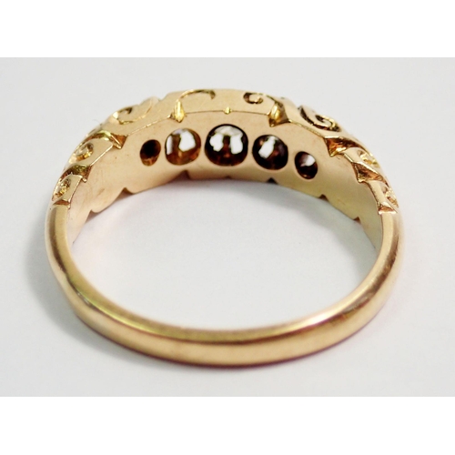 316 - An 18 carat gold ring set five graduated diamonds, size J to K, 3.7g