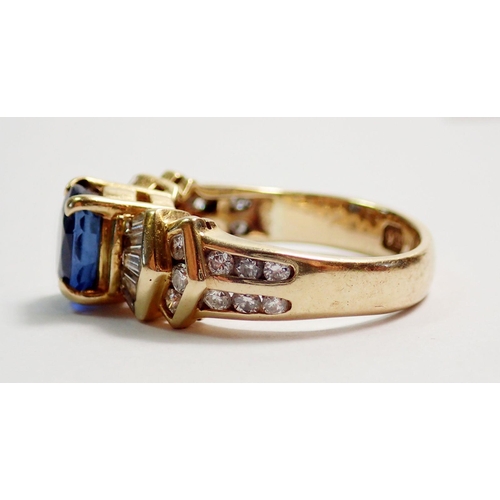 318 - A 9ct gold ring set oval cut blue sapphire on stepped shoulders set baguette and brilliant cut white... 