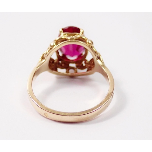 319 - A French 18 carat gold ring set oval cut synthetic ruby, size H, 3.5g