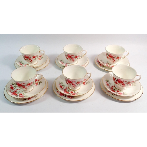 32 - A Queen Anne floral tea service comprising six cups, saucers and side plates