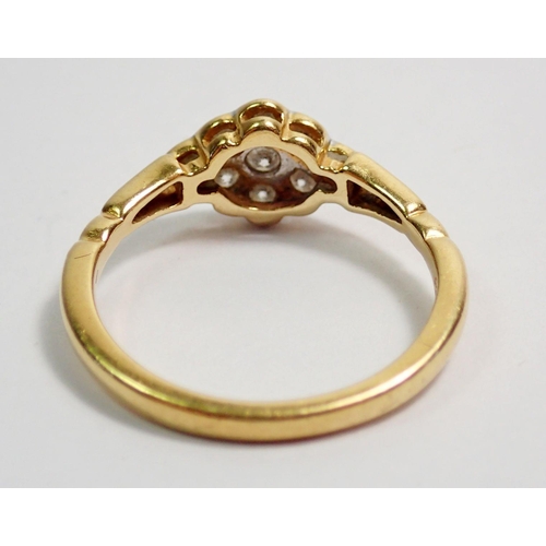 321 - An 18 carat gold ring set panel of nine diamonds, size M to N, 2.7g