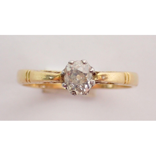 328 - A gold ring set solitaire diamond, size M to N, 2.6g, unmarked but thought to be 18ct