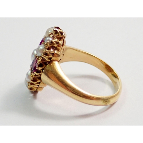 335 - A Victorian 18 carat gold ring set arrangement of four rubies and fifteen pearls, size M, 8.2g, 1.8c... 