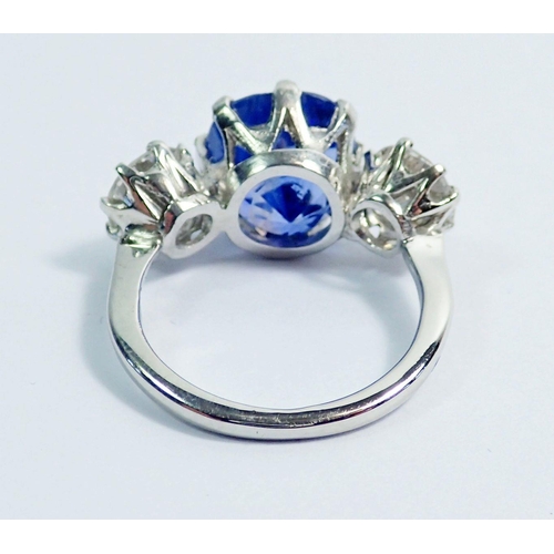 337 - A fine 18 carat white gold Ceylon sapphire and diamond ring, the central natural sapphire  approx. 5... 