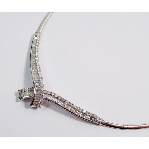 345 - A fine 18 carat white gold collar necklace with crossover front set graduated panels of baguette and... 