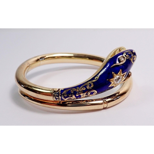 348 - An antique gold snake form bangle with blue enamel and gilt painted head inset diamonds, the open mo... 