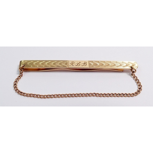 355 - A 9ct gold tie clip, 8.7g, engraved initials RLB, 7cm