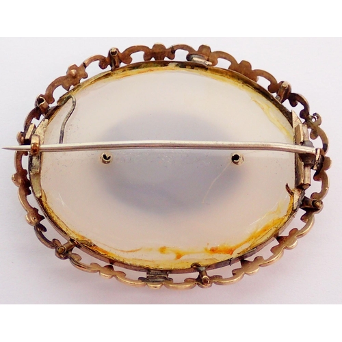 357 - A Victorian white agate mourning brooch in yellow metal and turquoise surround, inset hair panel, 4.... 