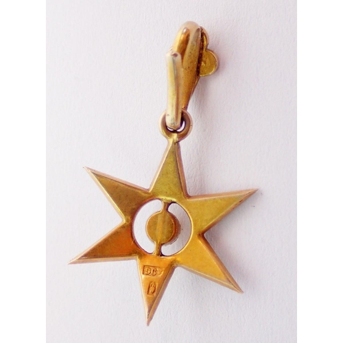 358 - A Edwardian 9 carat gold star form pendant set pearls, total drop 4cm x 1.6cm, 1.8g