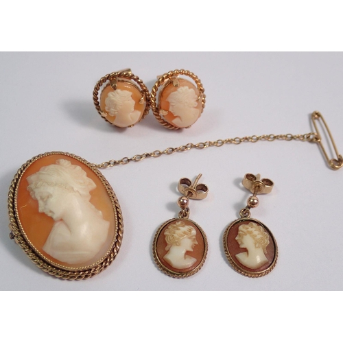 371 - A 9 carat gold cameo brooch 3 x 2.2cm and matching earrings plus another pair of 9 carat gold cameo ... 