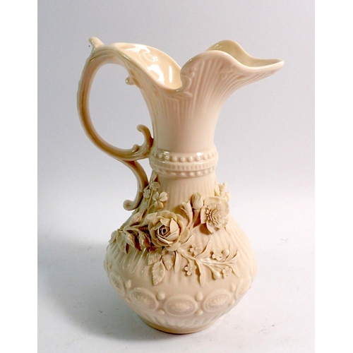 38 - A Belleek ewer with floral decoration, 22cm