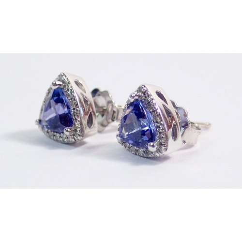 380 - A pair of 14 carat white gold trillion cut tanzanite and diamond earrings, 2.2g, 7mm across