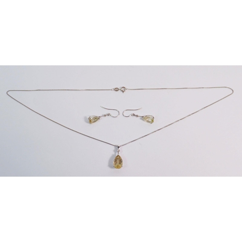 384 - A pair of 9 carat white gold earrings set citrines and chip diamonds and matching pendant necklace, ... 