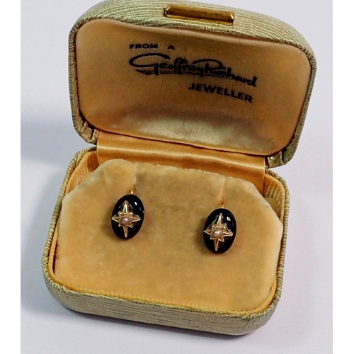 389 - A pair of Victorian black and gold earrings set pearls