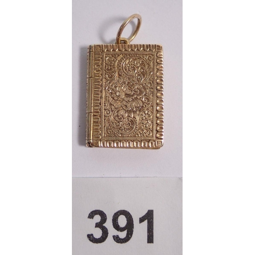 391 - A Victorian gold book form locket with engine turned decoration, 3.3g, 2.3 x 1.1cm, unmarked