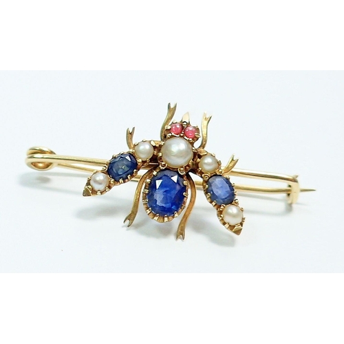 393 - An 18 carat gold bee form brooch set sapphires, pearls and rubies, 3.5cm wide, 2.9g