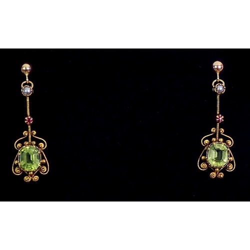 400 - A pair of 18 carat gold earrings set peridot, rubies and grey pearls, 2.4g, 2.5cm drop