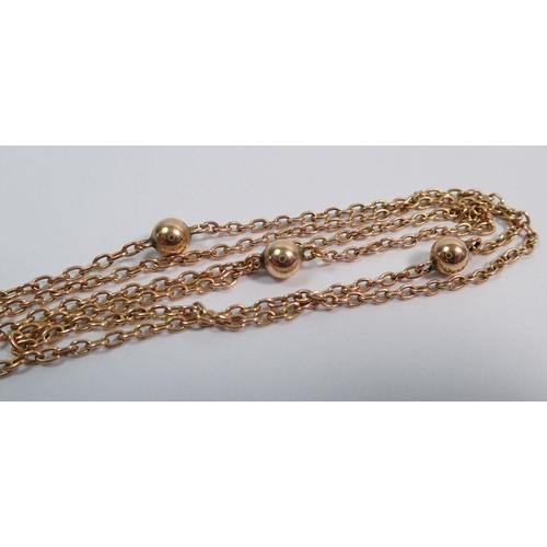 404 - A 9 carat gold fob chain with interspersed ball decoration, 13g approx 135cm long