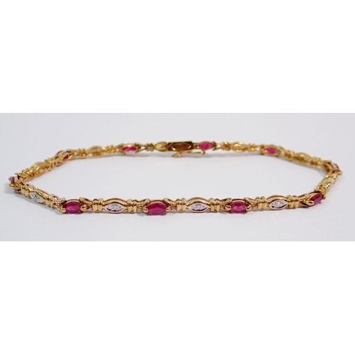 408 - A 9 carat gold bracelet set marquise cut rubies and chip diamonds, 5.3g, 18cm long