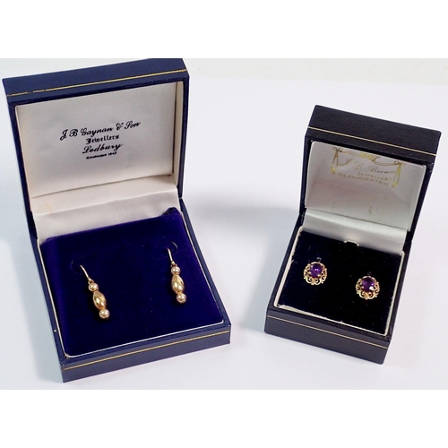 409 - A pair of 9 carat gold and amethyst earrings, 1.5g and a yellow metal pair unmarked