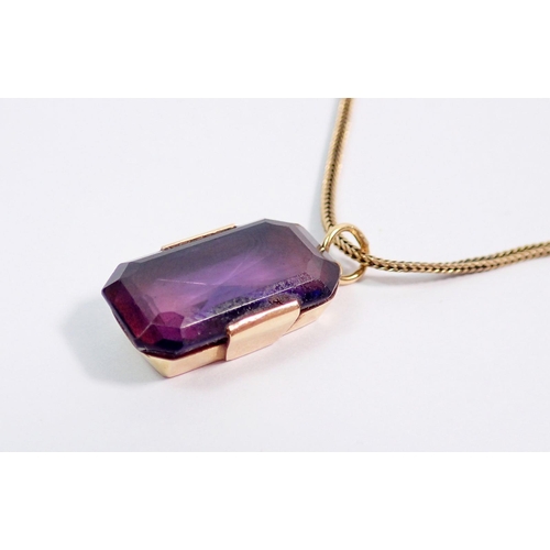 415 - A yellow metal and amethyst pendant (tested as gold) on 9 carat gold chain (chain 2.7g) plus a yello... 