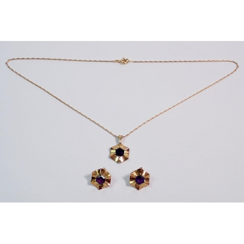 419 - A 9 carat gold flower form pendant and earrings set amethysts - boxed